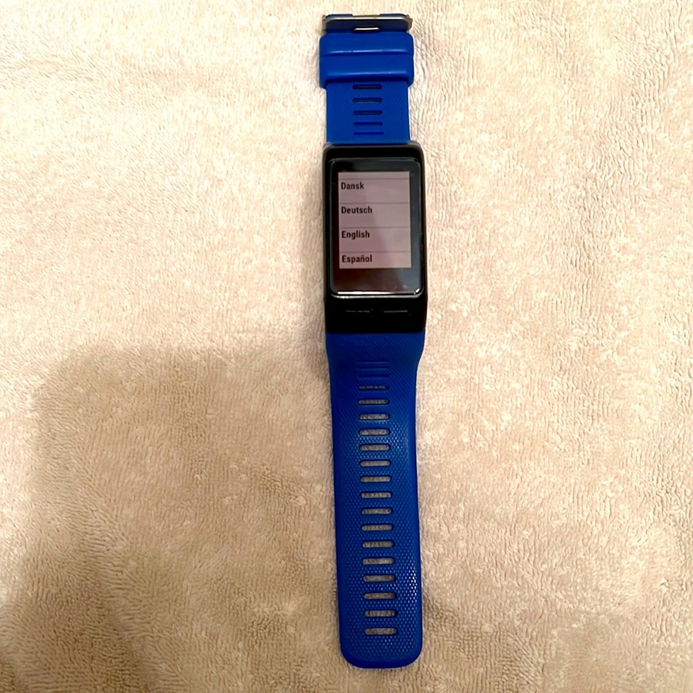 Garmin Vivoactive HR sports watch with GPS; w charge base and numerous bands.